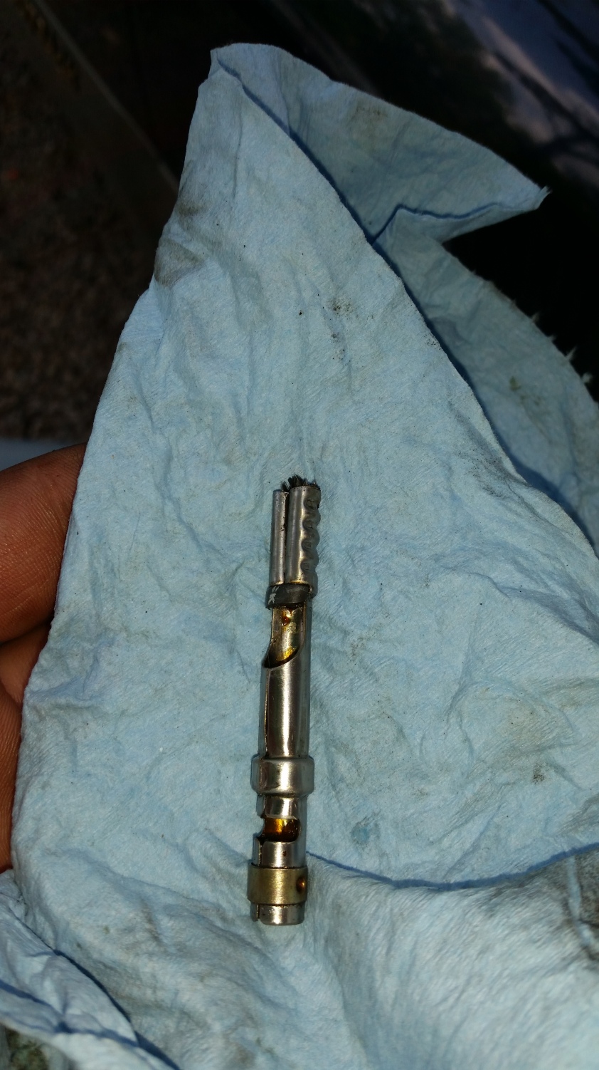 The internal part of the spark plug wire, I am sure it wasn't great for the engine to have one cylinder with such an intermittent connection